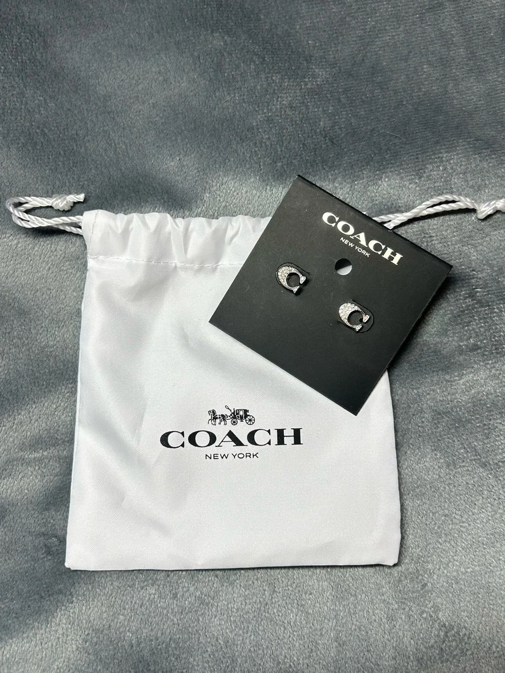 Coach Clear Crystal Stud Earrings with White Logo Pouch